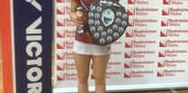 Badminton player retains top titles