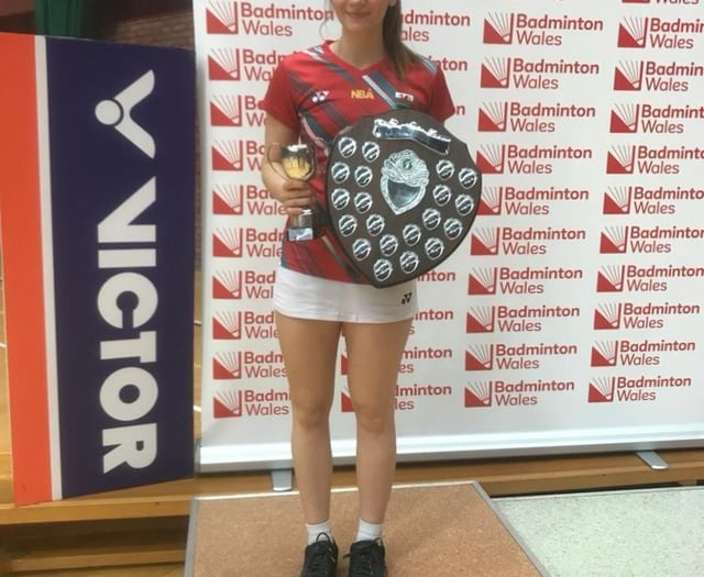 Badminton player retains top titles