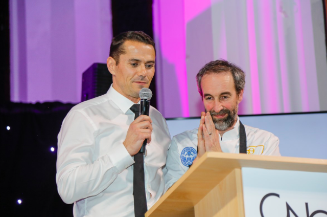 David Loosemore, one of the organisers of Chefs' Night Out and chef Stephen Terry watch the bidding rise for Stephen's services during the private auction during the event.