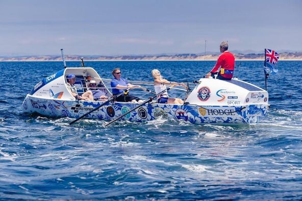 Freight train ocean seas batter Monmouthshire rowers' boat