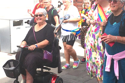 Rainbows, boas and bright blue skies as Aber Pride arrives in town 