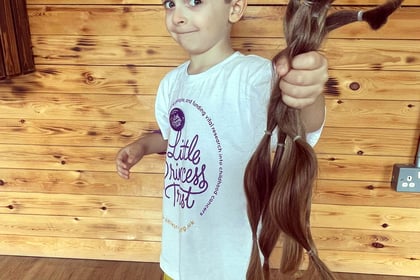 Brave brothers chop off 28 inches of hair for charity