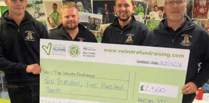 Raglan Young Farmers hand over cash to charity