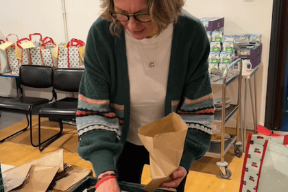 Labour candidate wraps Christmas food parcels for local families