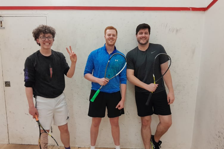 Rob Ellis, centre, with fellow club competition contenders Matthew Hughes and Matt Thompson, won his first round match 