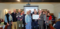 Gathering of the Green tractor enthusiasts donate to Welsh charity