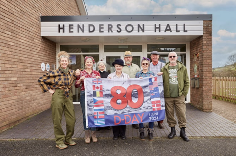 Members of the D-Day Celebrations Organising Committee in front of Henderson Hall, the venue for all celebrations on the day (Copyright: Scott Goodsell)
