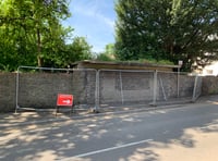 

Should this old bus shelter be put out of its misery? 
