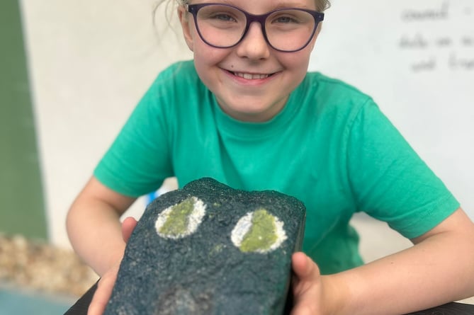 Rosalie with Sidney the Stone Snake