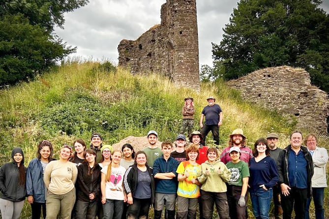 Group with castle in background