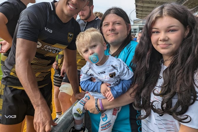 Rio Harrison, two, with grandad Paul Sainsbury and aunty Kelcea Sainsbury and namesake rugby star Rio Dyer