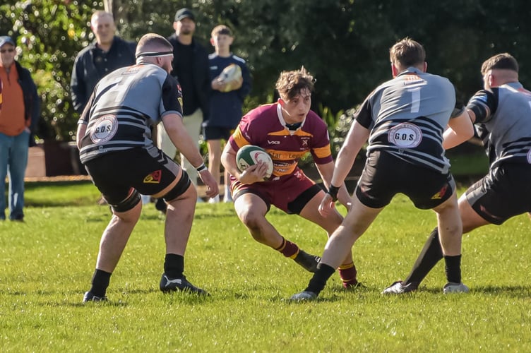 An Aber back takes on three defenders 