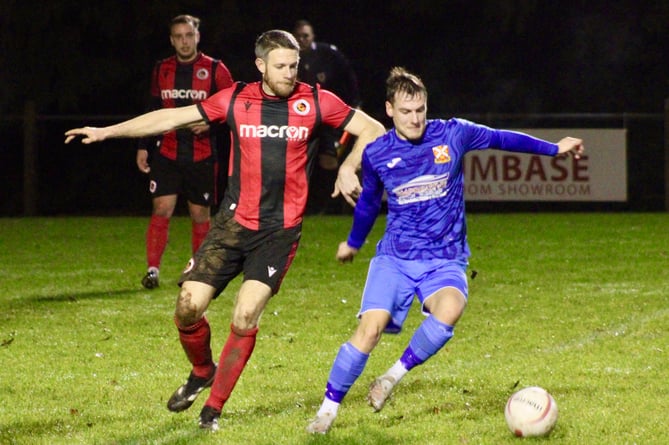 An Aber player shields the ball