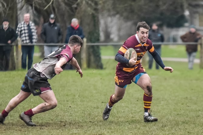 An Aber player spots a gap