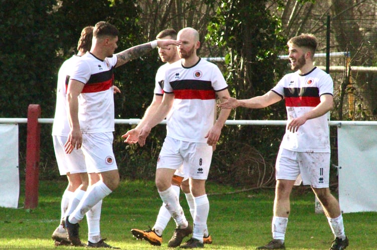 Goytre players congratulate Lewis Green