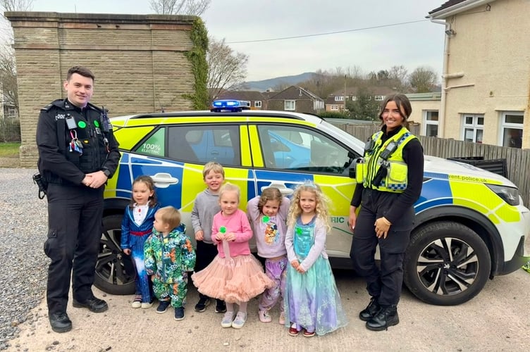 Youngsters at Tiny Tots loved meeting local officers and trying the sirens on the car!