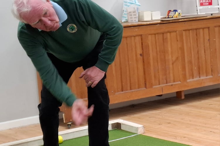 Jerry Haslett (skip) delivers the last bowl of the match against Dingestow